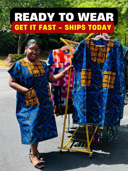 Woman wearing a floor-length Ankara Bubu gown with wide sleeves, front pockets, and a relaxed fit, standing outdoors.